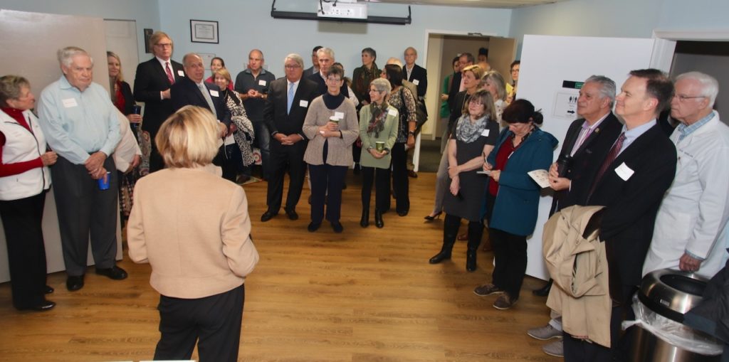 Anniversary Celebration attendees listening to CEO Julie Bilodeau